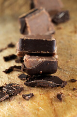 Pieces of chocolate candy closeup. Shallow depth of field