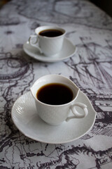 Fototapeta na wymiar Two cups of coffee on the table