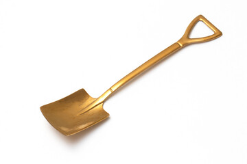 Top view of golden spoon shovel isolated white background.