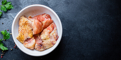 pieces of raw chicken, rooster or goose fresh farm meat ready to eat on the table for healthy meal snack outdoor top view copy space for text food background image rustic keto or paleo diet