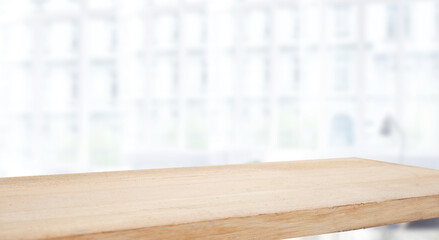 empty wooden table on background of abstract blur white interior, montage, product display, inside and window..