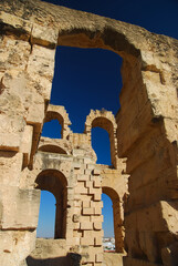 Colosseum in El Jem, Tunisia, Afrika. Collumns and blue sky