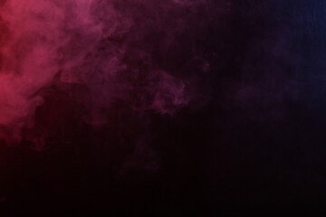 Background of dense smoke in red-blue neon light