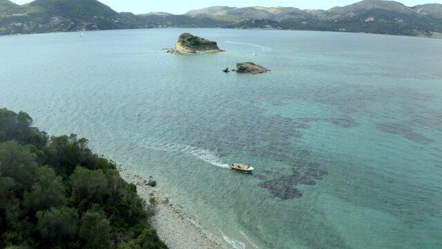 Drone flying over marathonisi (turtle island) in Zakynthos, Greece