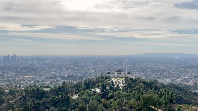 Griffith Observatory landmark skyline, Downtown City of Los Angeles, during the day, cloudy sky