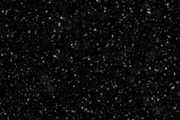 High-quality simulation of a Snowstorm. Flying Snowflakes. Blank to add to photos. Winter Background. Snowfall, Storm, Blizzard. Isolate on a black background.