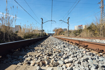 Fototapeta na wymiar empty railway with electric cables above