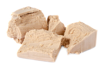 Yeast isolated on white background. Pressed fresh yeast for making bread and dough isolated on white background. Yeast pieces isolated on white background. Pile of pressed yeast.