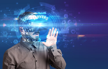 Businessman looking through Virtual Reality glasses with SERVERS inscription, innovative technology concept