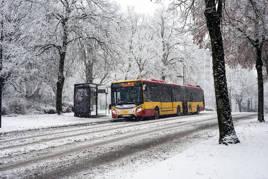 Mulhouse - France - 15 January 2021 - view of yellow public bus by the Solea compagny rolling during a snowy day