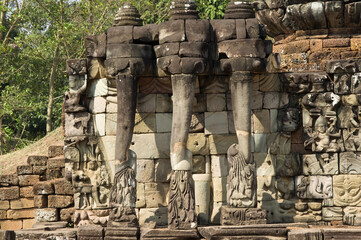 Fototapeta premium Three-headed elephant gathering lotus flowers with their trunks, Terrace of the Elephants, Angkor Thom, Siem Reap, Cambodia, Asia