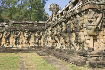 Fototapeta na wymiar Wall carved with Garudas and lions, Terrace of the Elephants, Angkor Thom, Siem Reap, Cambodia, Asia