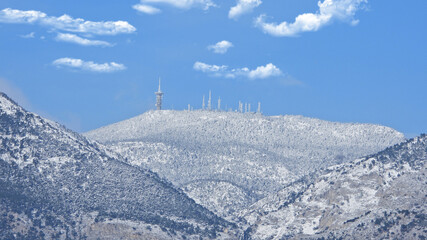 Zoom photo of beautiful mountain of Parnitha covered in snow, Athens, Attica, Greece