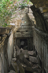Ruins of the Beng Mealea temple invaded by the roots and trees, Angkor, Siem Reap, Cambodia, Asia
