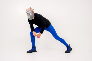 Funny strange man in respirator posing over white background