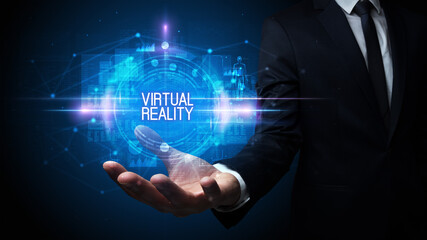 Man hand holding VIRTUAL REALITY inscription, technology concept
