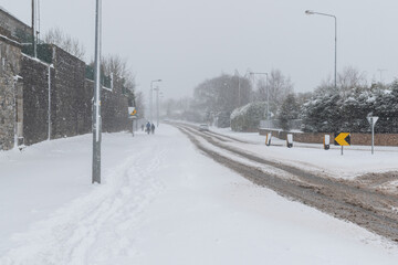Snowy winter road during blizzard . Heavy snow storm.