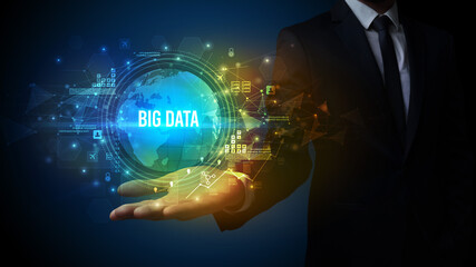 Elegant hand holding BIG DATA inscription, digital technology concept