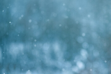 Abstract blurred illustration. bokeh background.  Defocused white lights and snow on the morning