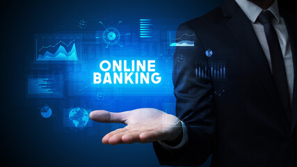 Hand of Businessman holding ONLINE BANKING inscription, business success concept