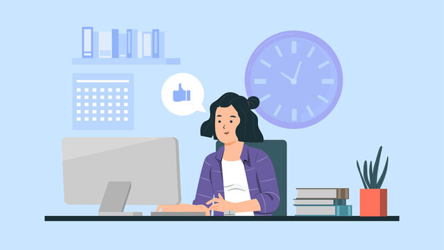 Business woman working on computer at her office desk.