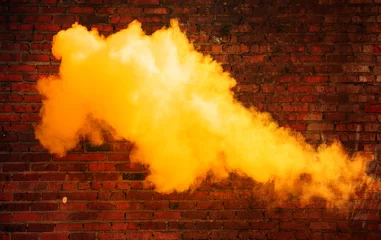 Deurstickers White, dense fume on the brick wall background © konradbak