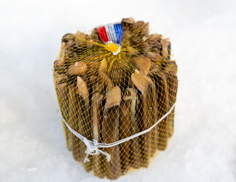 Stack of Solen  marginatus, common name "grooved razor shell" (Italian: cannolicchio),sold at market on ice, seafood.