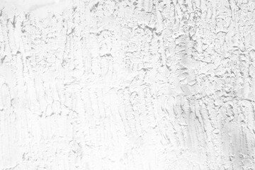 White Grunge Stucco Wall Texture Background with Light Leak from the Light.