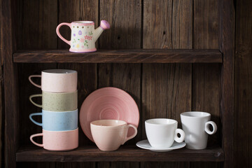  kitchen dishware on old dark wooden background