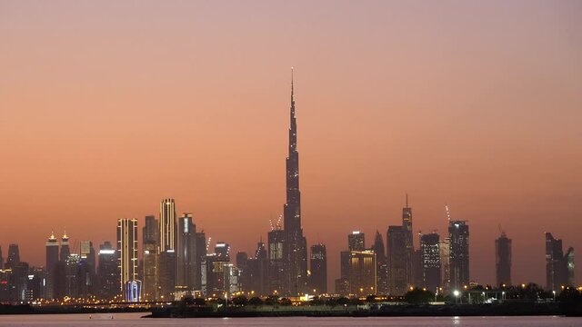 Dubai City Burj Khalifa Famous Landmark Skyline with Orange Sunset Sky