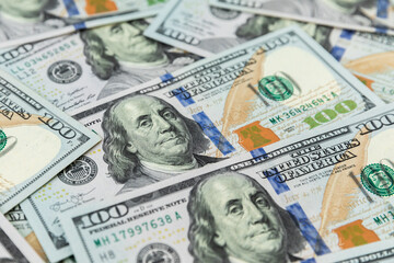 Texture of US dollars. Background of one hundred dollar bills.