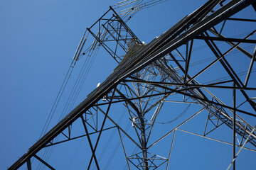 Electricity supply pylon blue sky