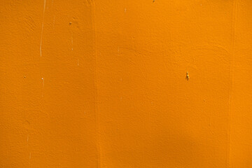 Vintage vibrant orange background. Sea ship metal wall painted yellow color