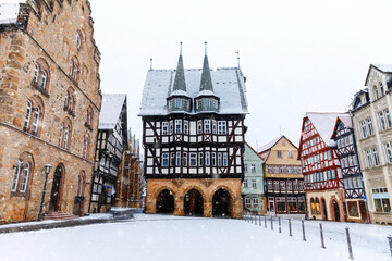 View of Alsfeld town hall, Weinhaus and church on main square, Germany. Historic city in Hesse, Vogelsberg, with old medieval frame half-timbered houses called Fachwerk or Fachwerhaus in German.