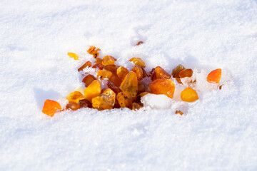 a lot of yellow amber in the snow