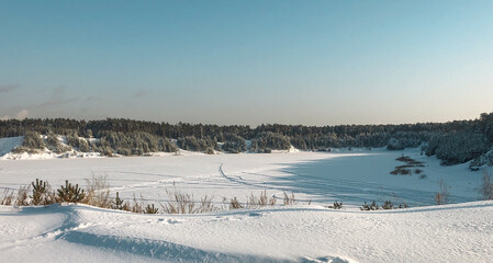 Fototapeta na wymiar Winter landscape: panoramic scenery in sunny day