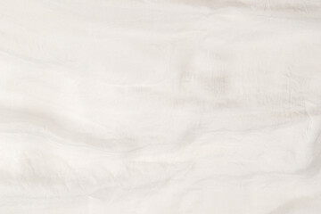 Soft smooth white silk fabric background. Fabric texture.