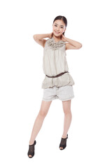 Fototapeta premium Young woman with hands on neck smiling