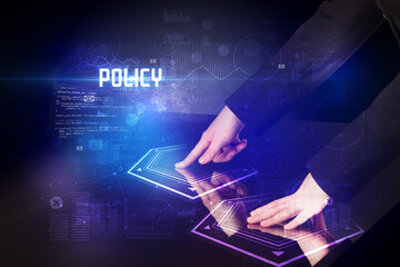 Hand touching digital table with POLICY inscription, new age security concept