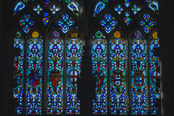 stained glass windows in the limit of an ancient monastery