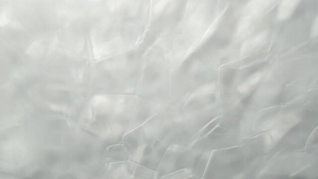 Soap foam popping bubbles background. Abstract white foam bubbles structure.