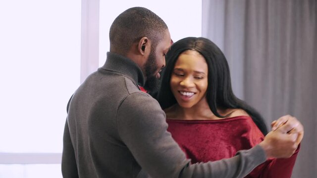 couple sitting and dancing together woman love flower young rose flowers happy gift people bouquet valentine smiling present red romantic giving beauty romance two beautiful boyfriend roses fa 