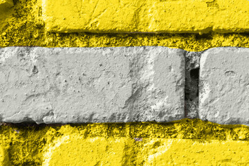 The brick wall is gray and yellow. The main color trend of 2021.