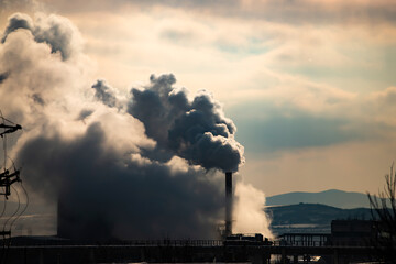 Factory pipe polluting air, environmental problems, smoke from chimneys