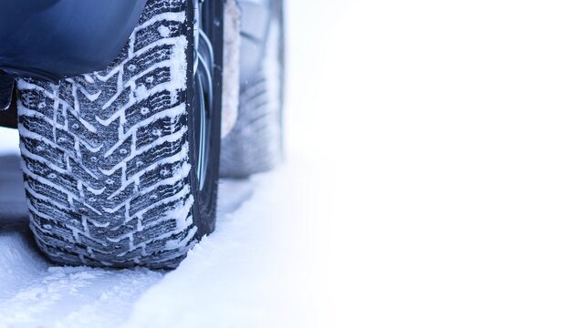 Winter. The car has wheels with winter tires and spikes.Winter. The car has wheels with winter tires and spikes.