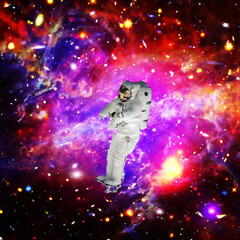 Fototapeta na wymiar Astronaut against deep space. The elements of this image furnished by NASA.