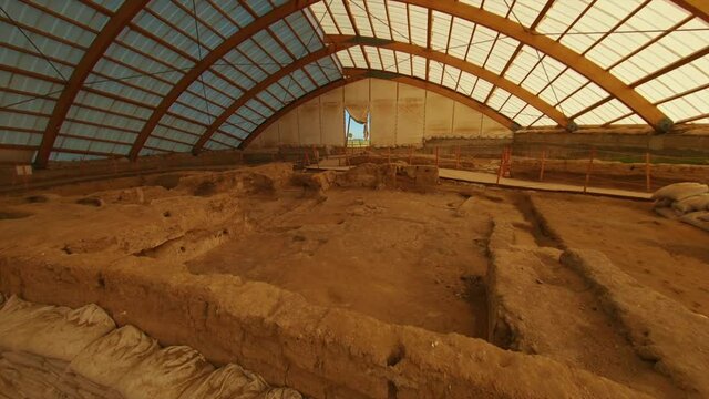 FPV drone shot of Catalhoyuk site. It is the largest and best-preserved Neolithic site found to date, it existed about 7500 BC 4K  fpv drone flying over the archaeological site.