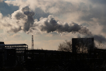 Factory pipe polluting air, environmental problems, smoke from chimneys