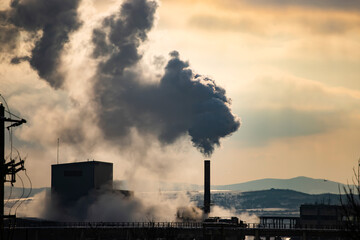 Factory pipe polluting air, environmental problems, smoke from chimneys