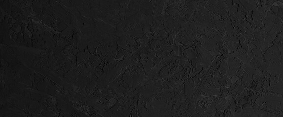 Black background of concrete or stone surface. Banner.